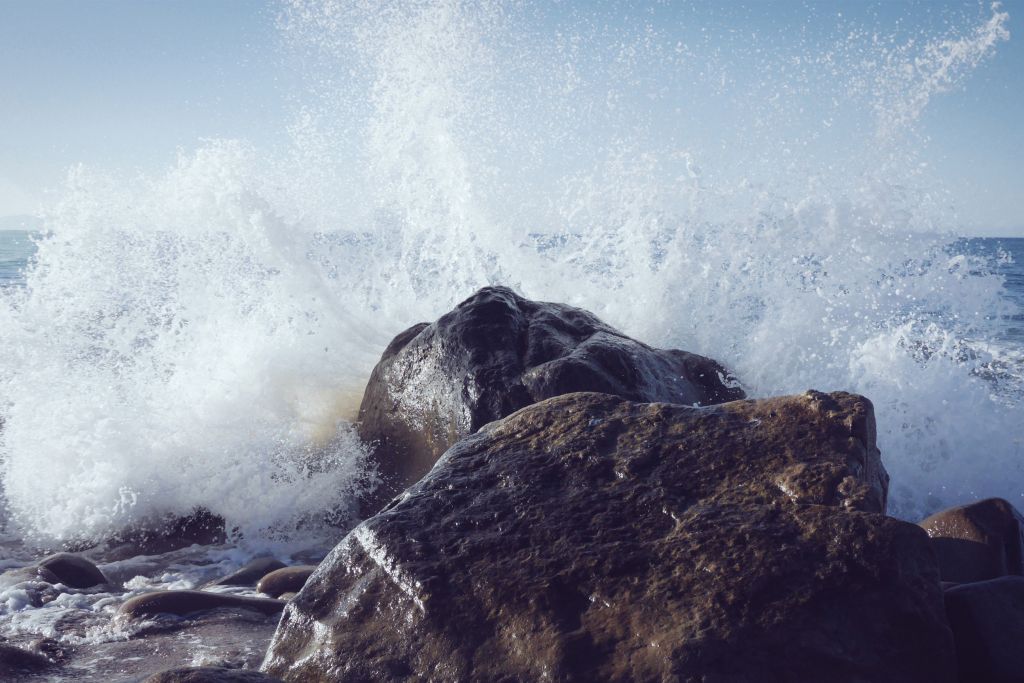 Wave crashing on rock